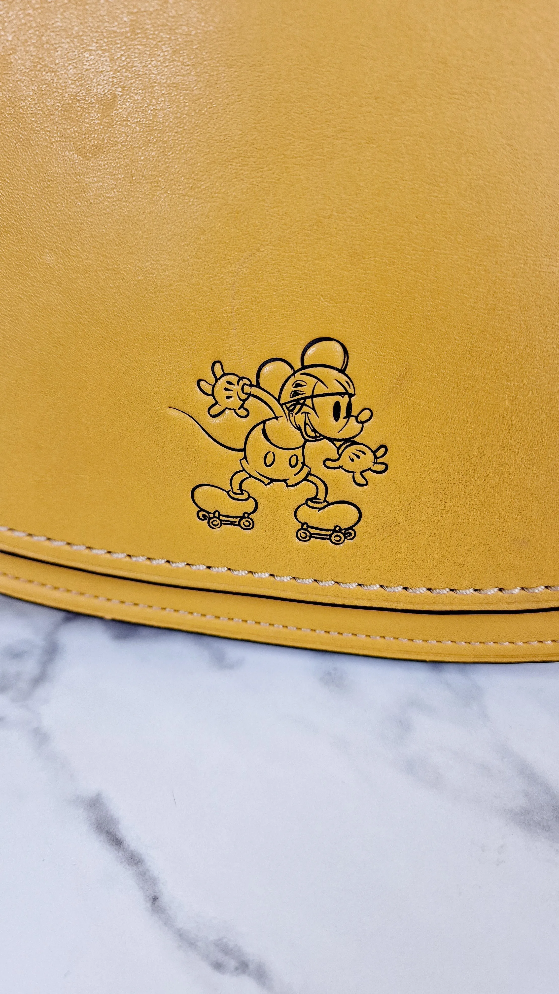 Disney X Coach 1941 Saddle Bag 23 with Mickey Mouse on Roller Skates in Flax Yellow Smooth Leather Crossbody Bag LIMITED EDITION - Coach 38421