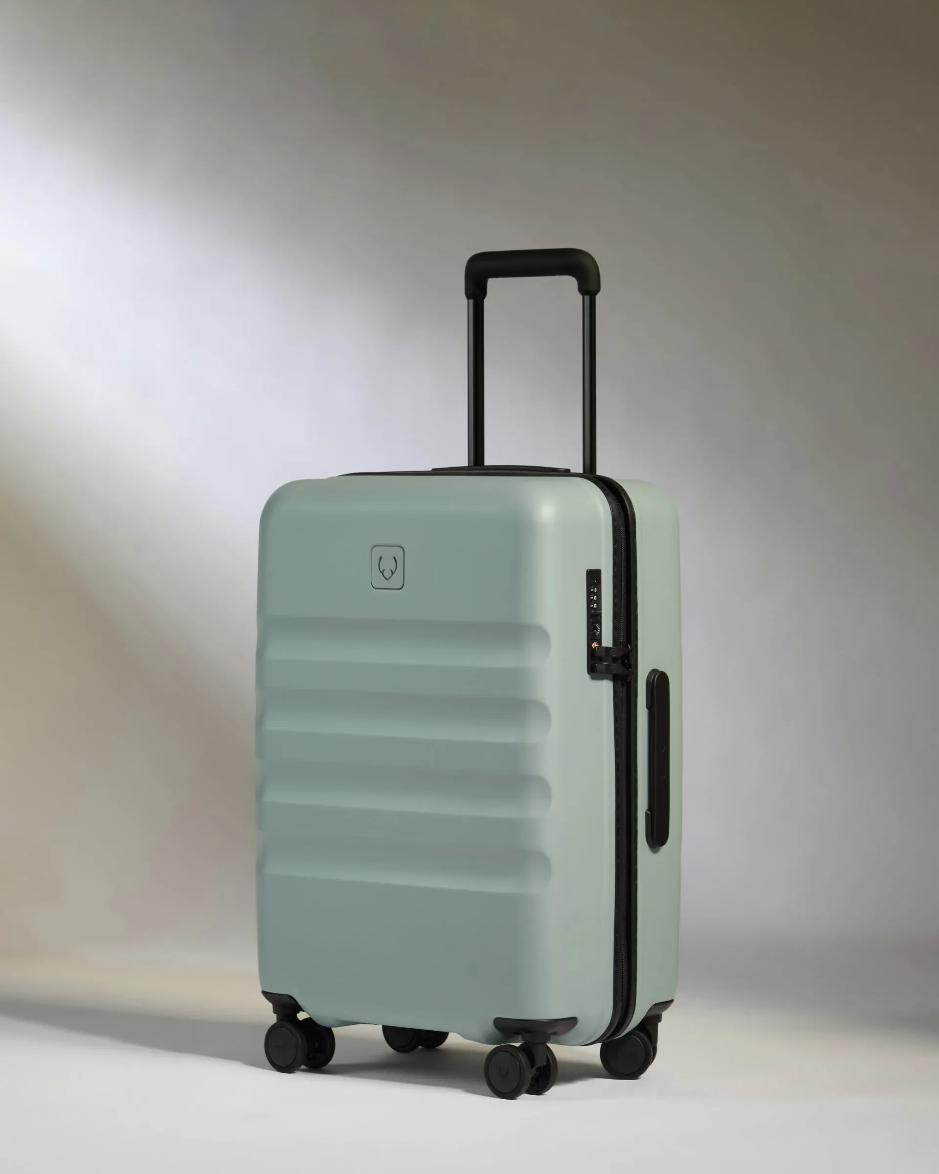 Large Cabin Suitcase in Mist Blue - Icon Stripe