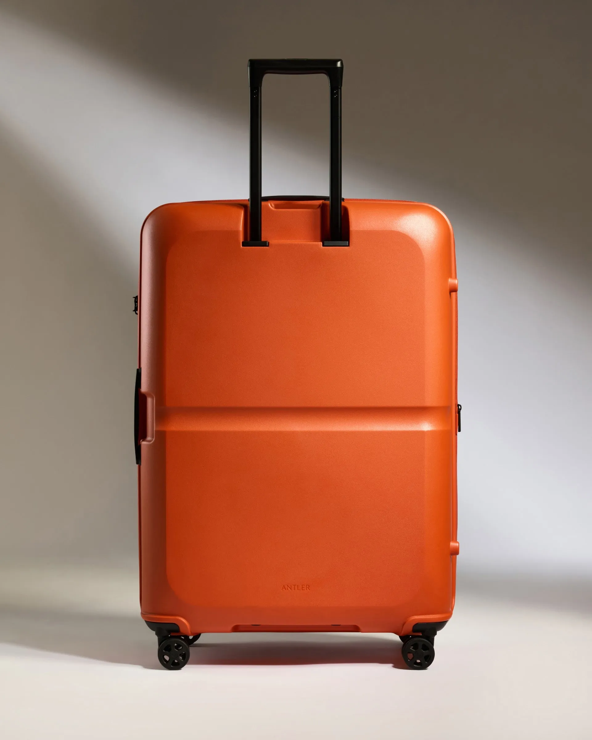 Large Suitcase in Ember Orange - Single Stripe