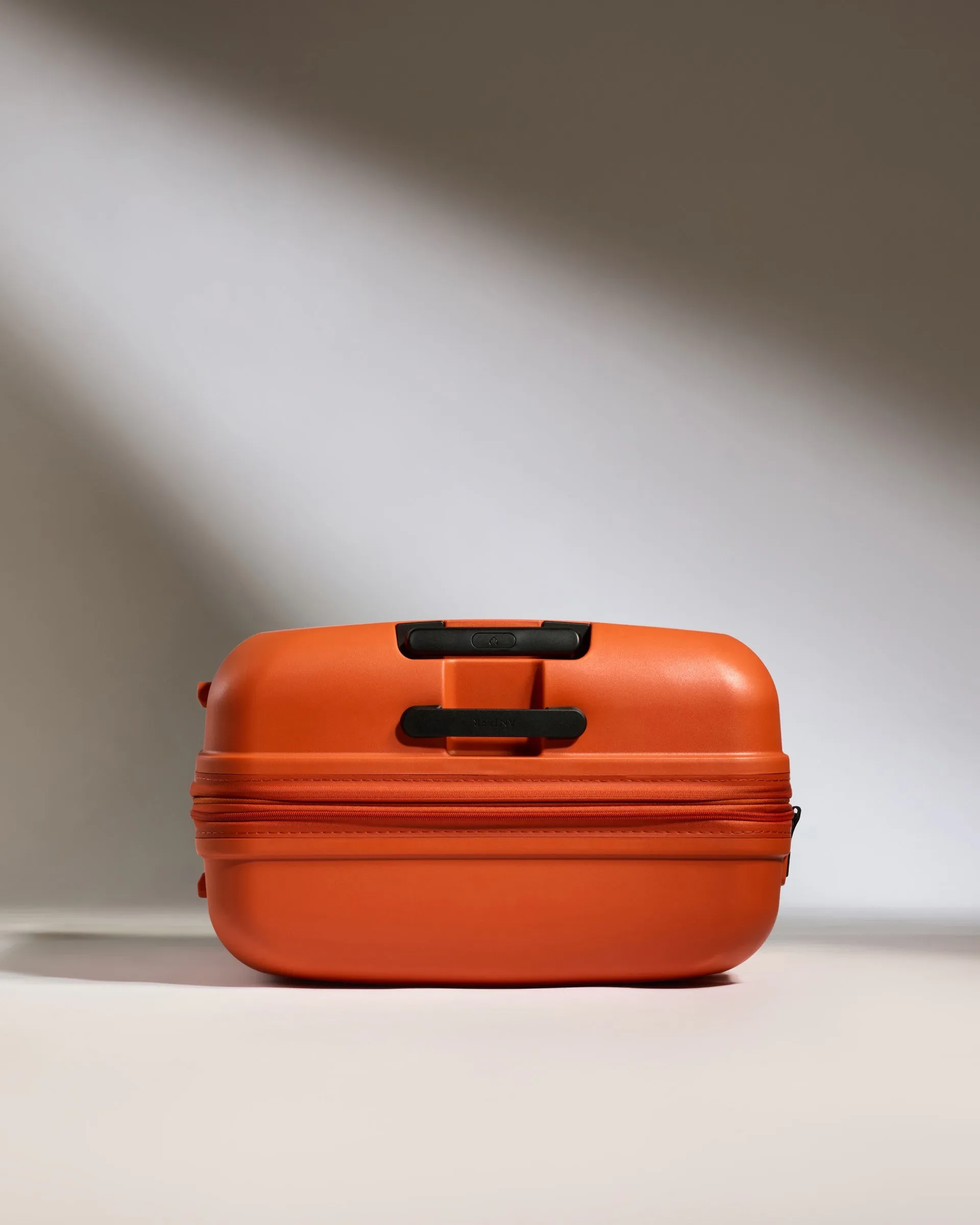 Large Suitcase in Ember Orange - Single Stripe