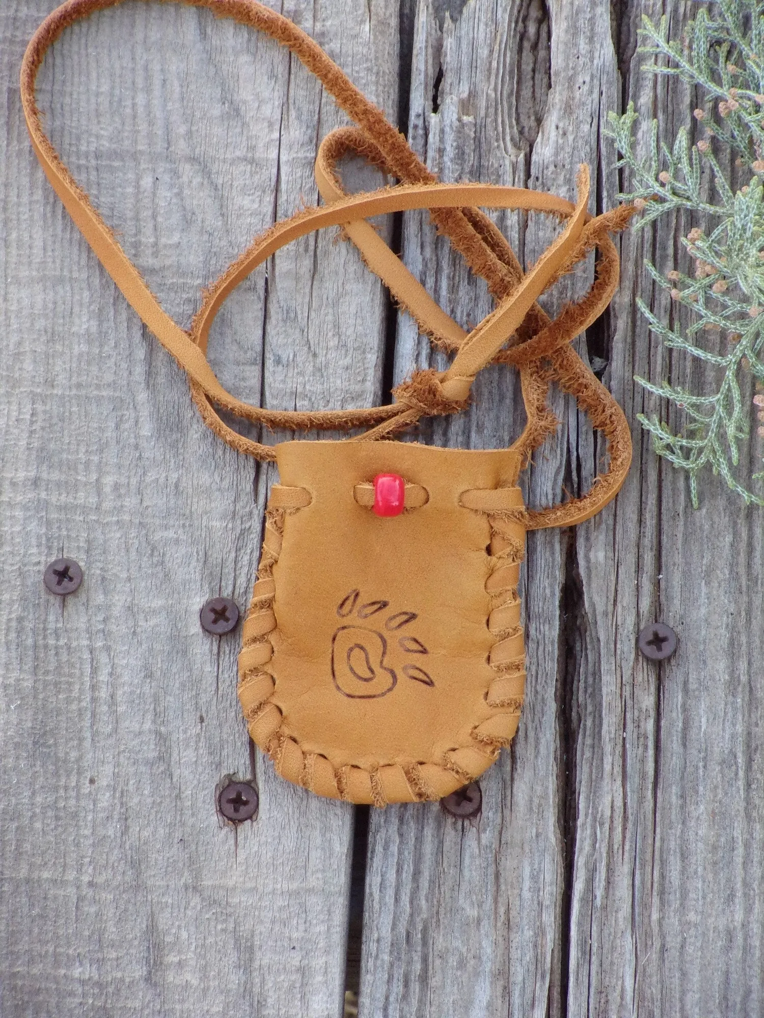 Leather medicine bag,  bear paw totem bag